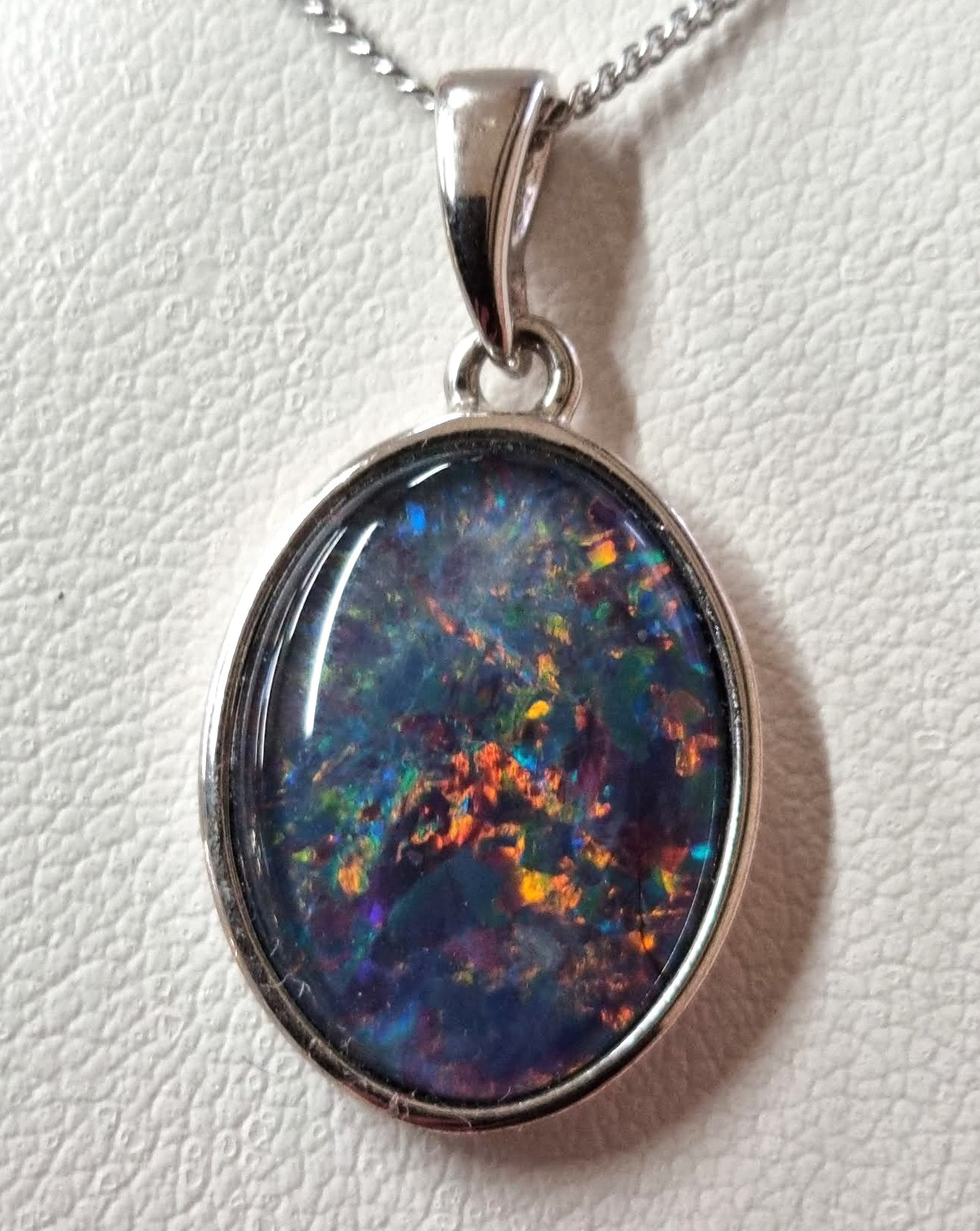 16x12mm oval gem quality opal triplet pendant in sterling silver